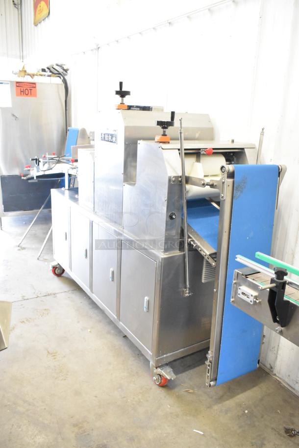 Seny Machinery SY-860 Automatic Bread Machine, 220V. Stainless steel build, floor model, condition appears good.