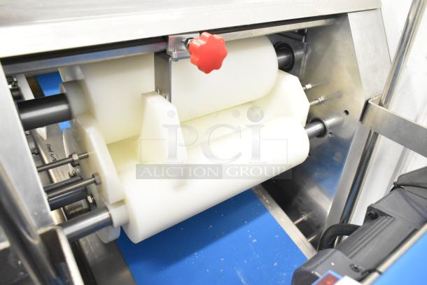 Seny Machinery SY-860 Commercial Bread Making Machine, 220V, features automatic filling, durable components, excellent condition.