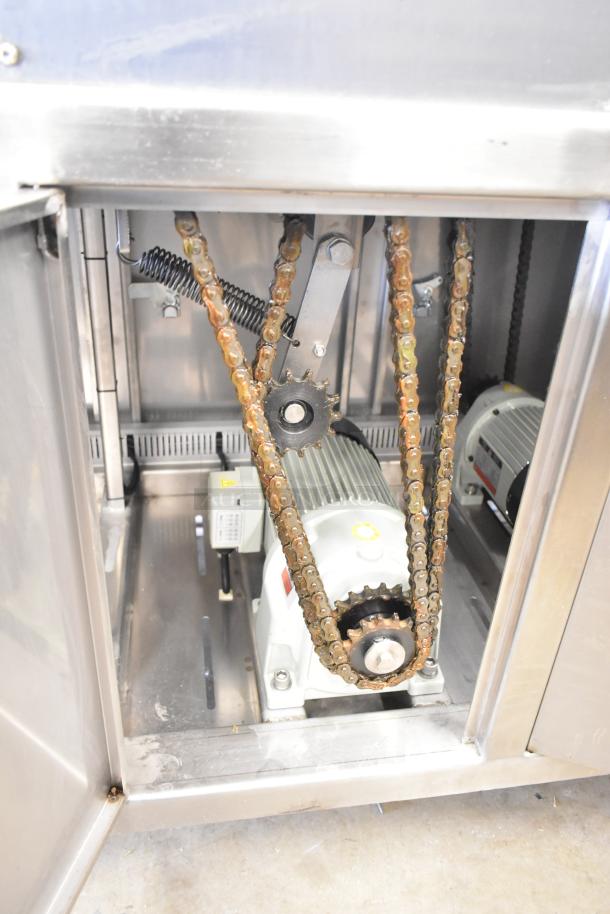 Seny Machinery SY-860 Automatic Bread Making Machine interior, showing chain mechanism and motor, 220 Volts.