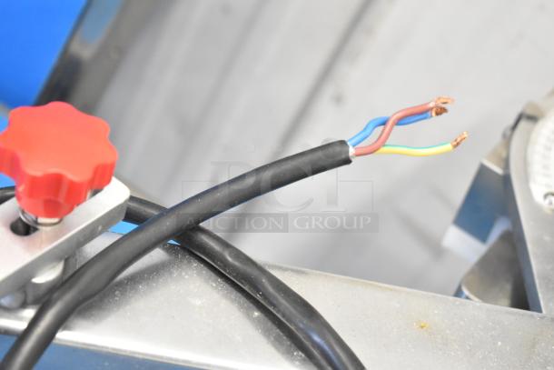 Seny Machinery SY-860 automatic bread making machine, showing exposed wiring and red knob, 220 volts, commercial use.