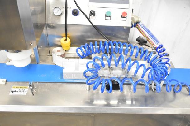 Luohe Orange Mechanical commercial forming machine, floor style, 220 volts, 3 phase. Includes control panel and warning label.