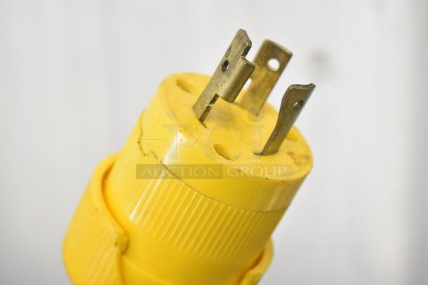 Close-up of yellow plug from Luohe Orange Mechanical Commercial Floor Forming Machine, 220V, 3 Phase.