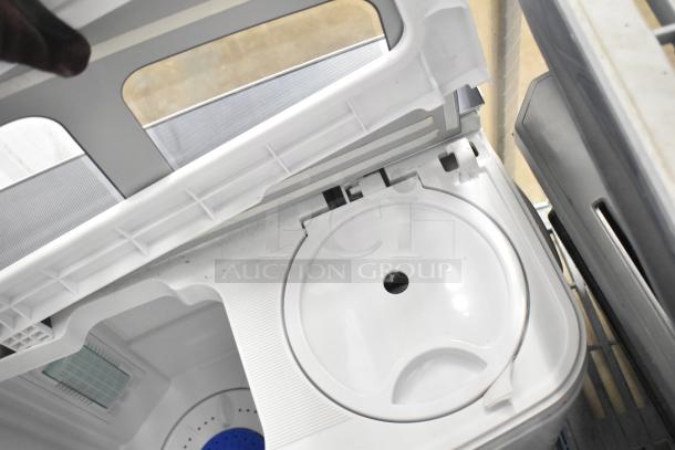 H01GN001 Portable Washing Machine, model H01GN001, 110V, 1 phase, with open lid showing washing drum and interior.