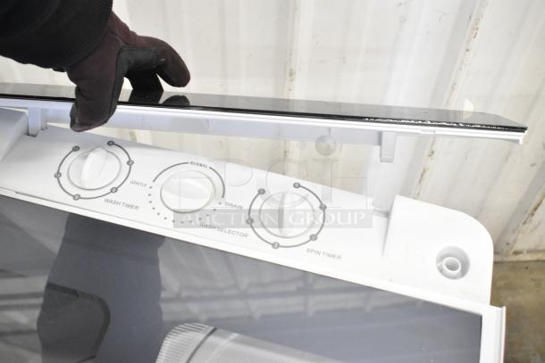 H01GN001 portable washing machine, 110 volts, 1 phase. Features wash timer, wash selector, and spin timer dials.