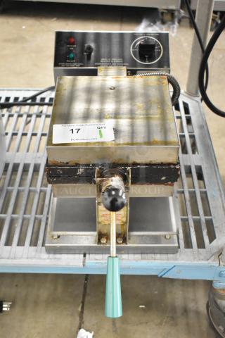 Gold Medal 5024 countertop waffle maker, 120 volts, 1 phase, visible wear, control panel, auction tag 17.