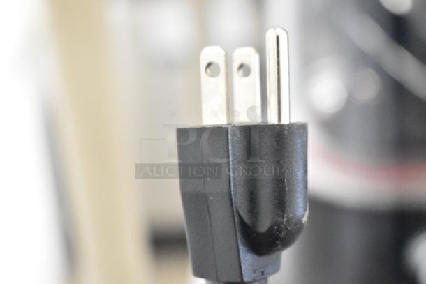 Close-up of a three-prong plug for the CH10L Countertop Hot Chocolate Machine. Model CH10L, 110 Volts, 1 Phase.