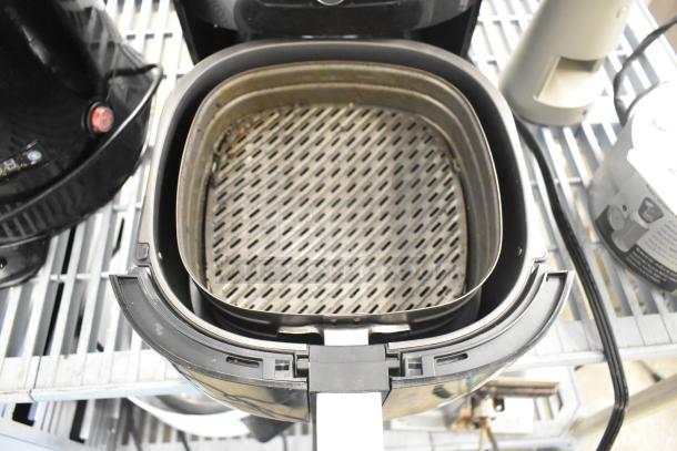 Philips HD96654 countertop air fryer, black, visible basket, lightly used, 120 volts, 1 phase, clean interior.