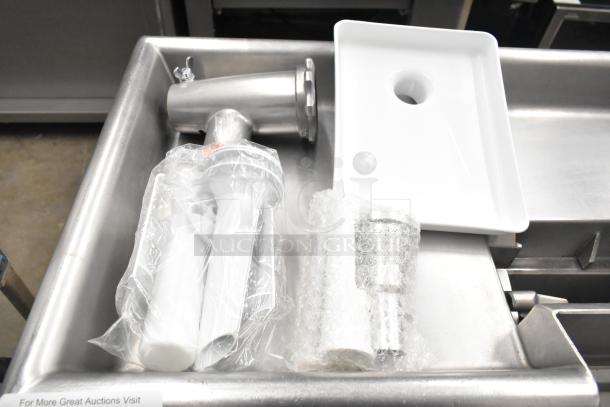 Ankarsrum meat grinder attachment in original box with accessories, wrapped in plastic and bubble wrap, like new condition.