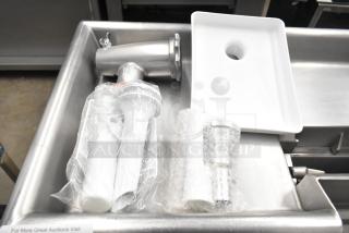 Ankarsrum meat grinder attachment in original box with accessories, wrapped in plastic and bubble wrap, like new condition.