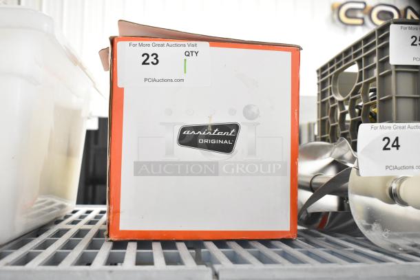 Ankarsrum meat grinder attachment in original box, featuring "Assistant Original" branding. Box condition is slightly worn.