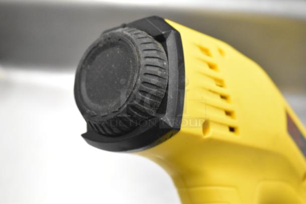 Stanley Electric Stapler/Nail Gun, yellow with black adjustment knob, in used condition.