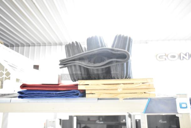 7 various items including countertop signs, mold baking pan liner, and a Waring panini press grease trap.