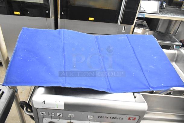 7 various items including countertop signs, mold baking pan liner, Waring panini press grease trap, visible. Condition varies.