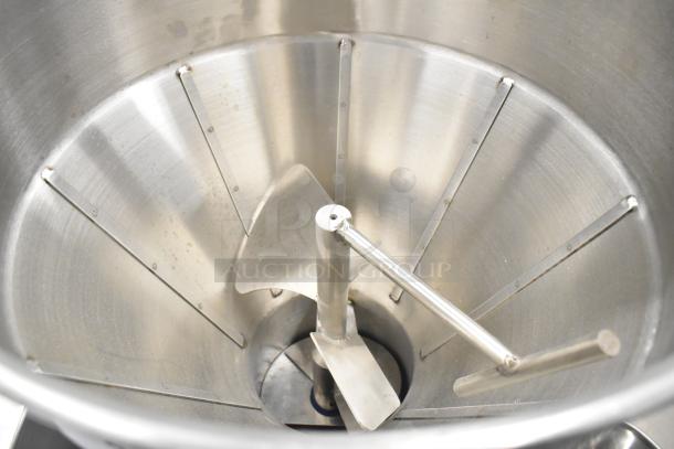 Luohe Orange floor-style filling machine interior, stainless steel, commercial casters, 220V, 3-phase, good condition.