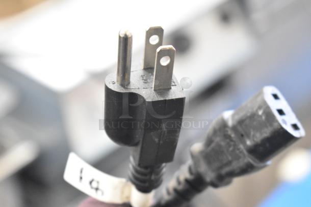 Close-up of a power plug for 2023 ZD200E-1 Countertop Pastry Donut Filling Machine, 110V, 1 Phase.