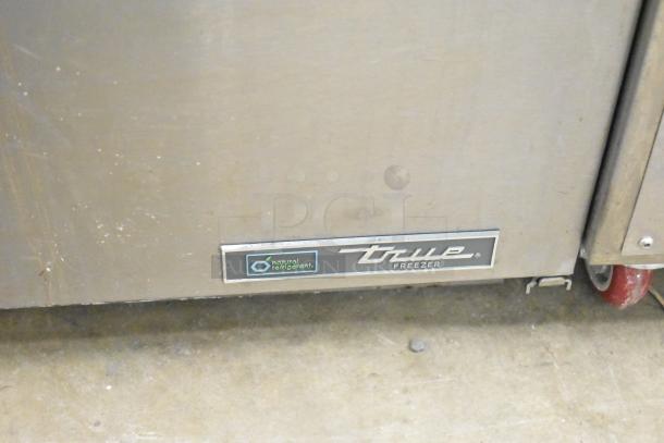 2021 True TUC-24F-HC undercounter freezer, single door, commercial casters, natural refrigerant label visible.
