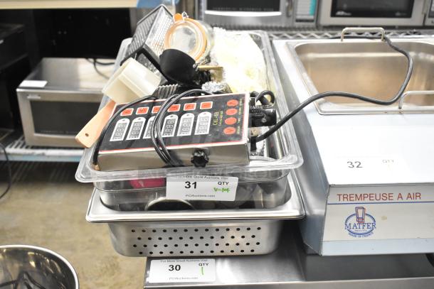 Lot of various items including a CAL-6B Calculagraph, kitchen utensils, bins, and accessories in used condition.