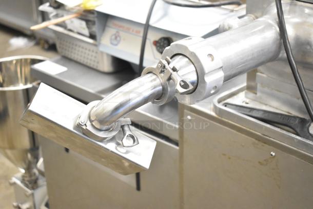 Luohe Orange commercial floor-style filling machine with stainless steel fittings, on casters. 220V, 3 phase.