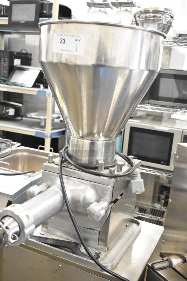 Luohe Orange commercial floor filling machine with stainless steel hopper on casters. 220V, 3-phase, tag indicating quantity 33.