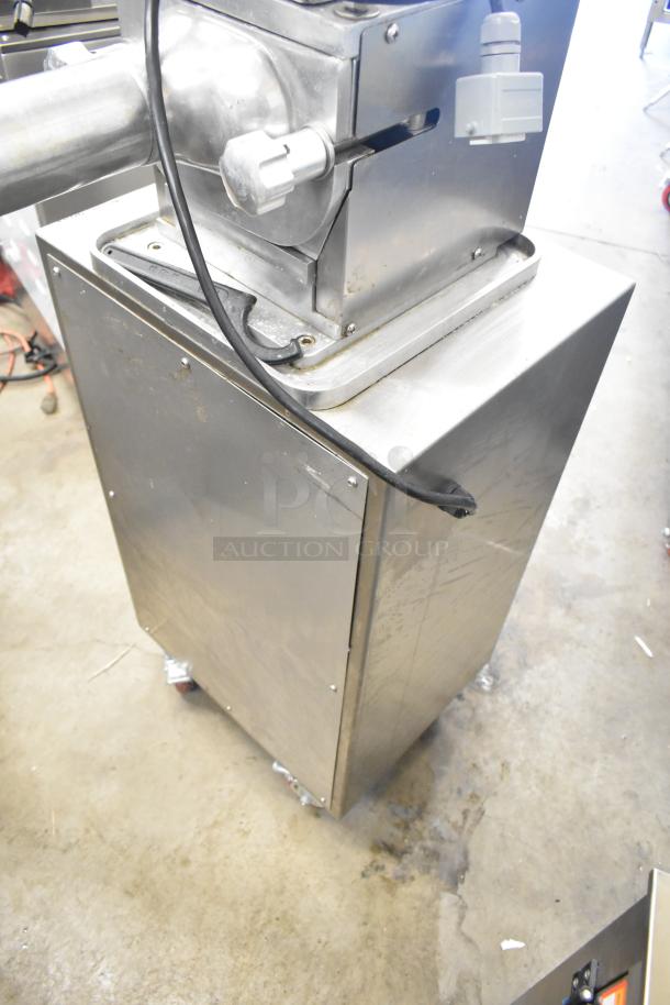 Luohe Orange commercial floor filling machine on casters, 220V, 3 phase. Stainless steel, good condition.