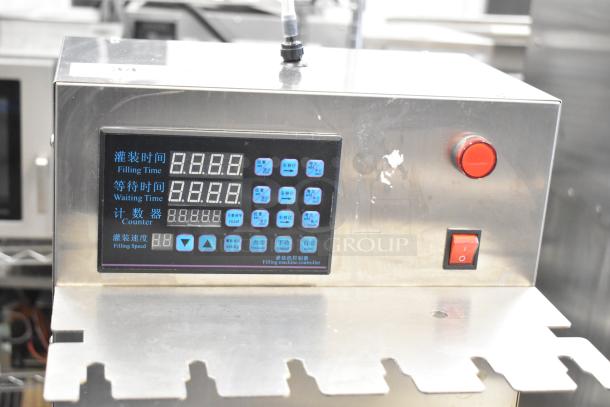 Commercial countertop high accuracy spout pouch filling machine with 6 heads for hot liquids. Features digital display and controls.