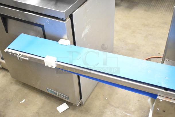 Luohe Orange commercial dough cutting machine, floor style, on casters. Features 220V, 3-phase power. Appears in good condition.