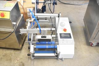 2023 C12 Countertop Semi-Automatic Round Bottle Labeling Machine, 220V, 1 Phase, with control panel and blue rollers.