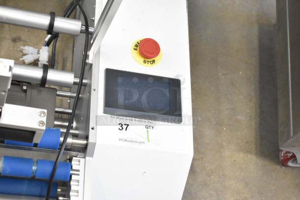 2023 C12 Countertop Semi-Automatic Round Bottle Labeling Machine, 220V, 1 Phase. Features emergency stop and display.