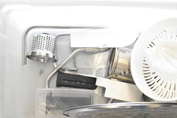 Lot of various kitchen items including a timer, metal pan, citrus juicer part, and plastic bin in used condition.