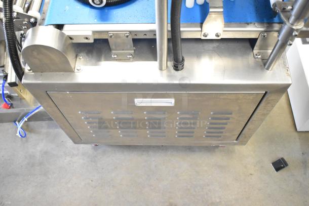 Seny Machinery commercial slicer & conveyor on casters, stainless steel, 220V, visible wear, industrial-grade.