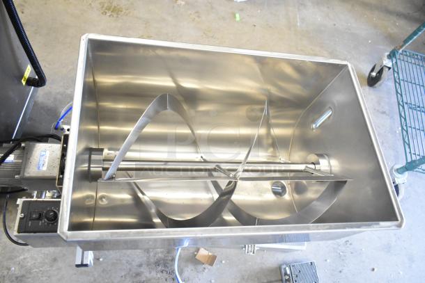 Commercial countertop meat mixer with foot pedal, stainless steel, digital controls, excellent condition. Features robust internal paddles.