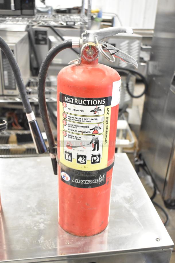 2 Amerex dry chemical fire extinguishers, red, with instruction labels, Advantage brand, pickup required, not shipped.