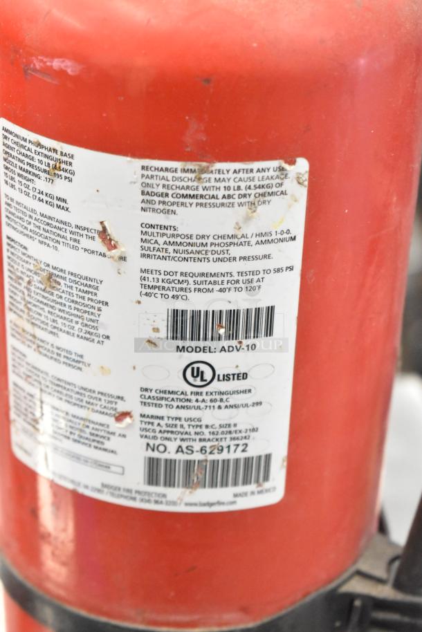 Two Amerex dry chemical fire extinguishers, model ADV-10, UL listed. Visible wear on labels. Buyer must pick up.
