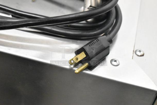 Frontline Commercial Fryer Oil Transport, features durable metal casing and casters for mobility, power cord shown.