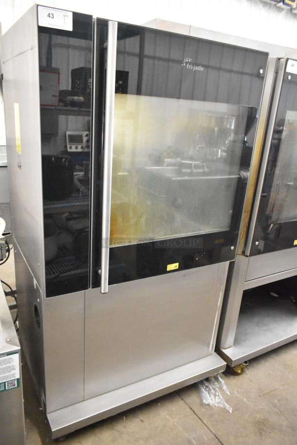 Fri-jado TDR7-P commercial electric rotisserie oven with stainless steel finish, glass front, on casters, 208V, 3-phase.