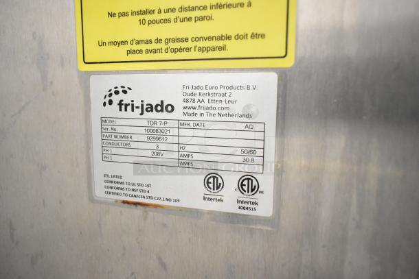 Fri-jado TDR7-P rotisserie oven label showing model, 208V, 3 phase, ETL and Intertek certifications, on stainless steel.