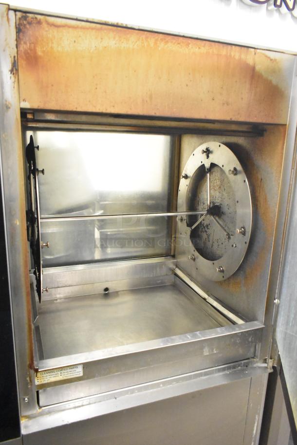 Fri-jado TDR7-P commercial rotisserie oven, electric, floor style, with casters. Shows visible wear, 208V, 3-phase.
