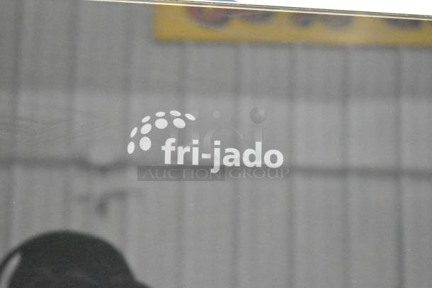 Fri-jado TDR7-P rotisserie oven logo on glass. Electric, commercial floor model with casters. 208V, 3-phase.