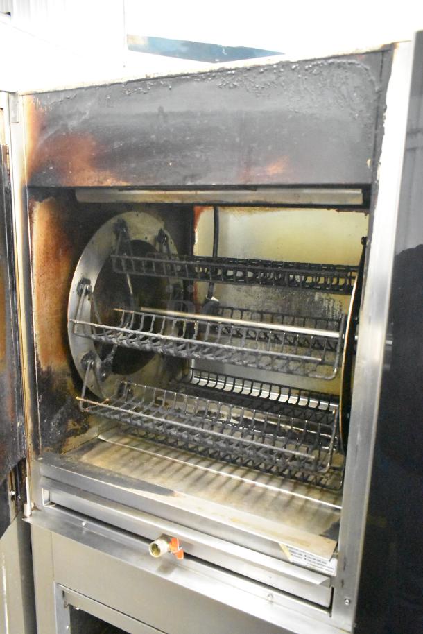 Fri-jado TDR7-P electric rotisserie oven, floor model with commercial casters, used condition, 208V, 3-phase.