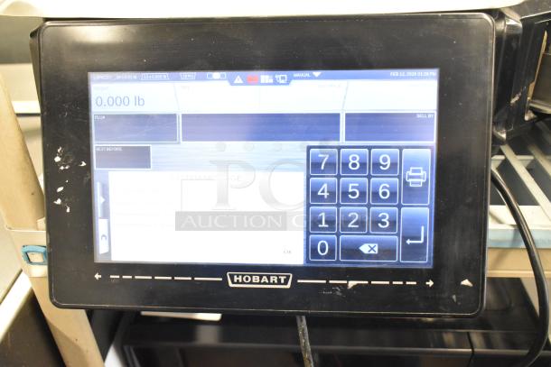 2017 Hobart HTi-7LH26 metal commercial countertop food portioning scale with digital display, tested and working.