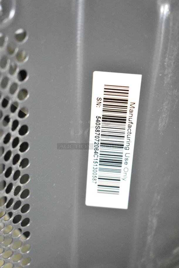 Barcoded label on Mainstays MS8436193153-03 microwave, indicating manufacturing use only.