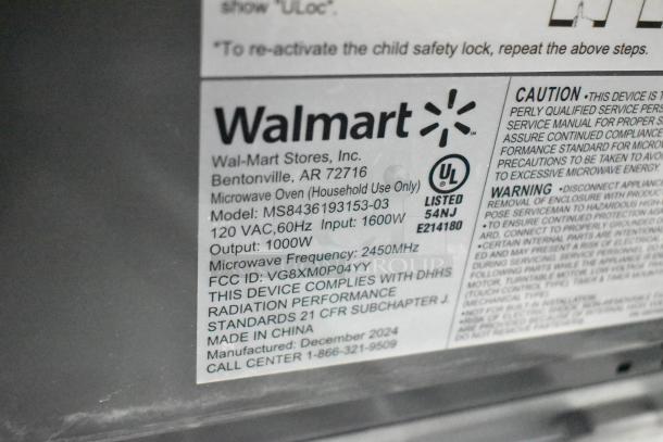 2024 Mainstays MS8436193153-03 Countertop Microwave Oven label. 120V, 1000W output, manufactured December 2024.