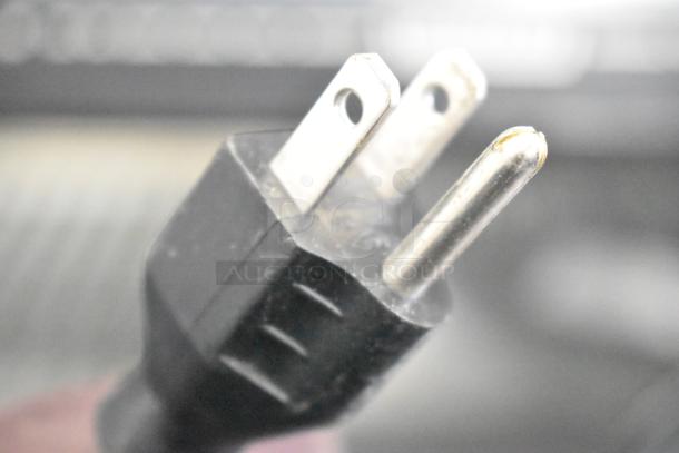 Close-up of power plug for 2017 Hobart HTi-7LH26 metal commercial food portioning scale. 120/208-240V, 1 Phase.