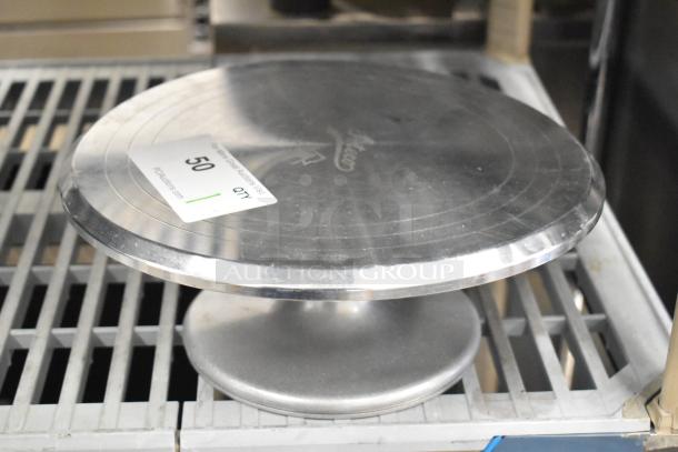 Ateco 615 12" aluminum cake turntable with non-slip base, revolving stand, used condition, visible brand engraving and auction label.