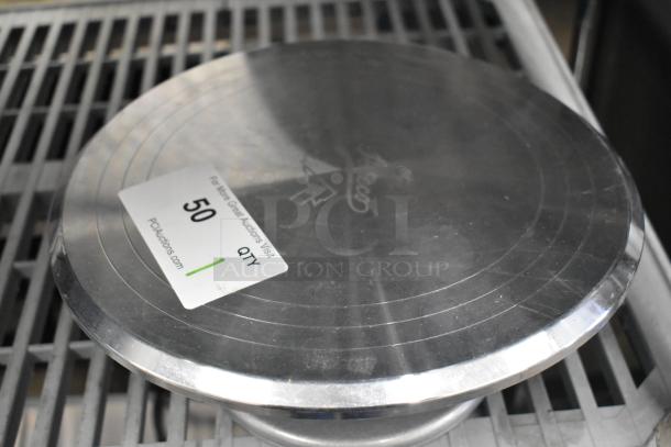 Ateco 615 12" aluminum cake turntable with non-slip base, slightly used, visible label with auction details.