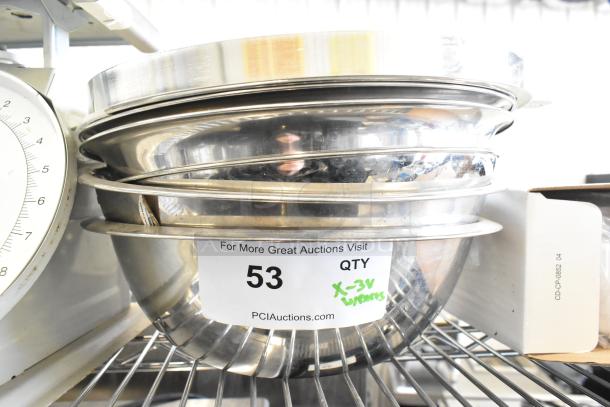 Three various scales including a Detecto SCS30A hanging produce scale, metal bowls stacked, label with "53" visible.