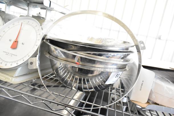 3 various scales including a Detecto SCS30A hanging produce scale in metal frame; good condition; label shown with item information.