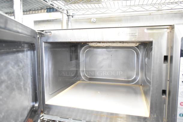 2019 Amana RCS10TS commercial countertop microwave oven, 120 volts, 1 phase. Some interior wear visible.