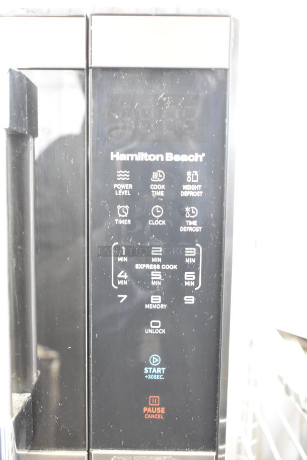 Hamilton Beach HB8436193153-09 microwave, digital control panel, 120 volts, 1 phase, slightly scratched surface, fully functional.