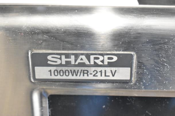 2023 Sharp R-21LVF Commercial Microwave Oven label, showing "1000W/R-21LV" marking, stainless steel finish.